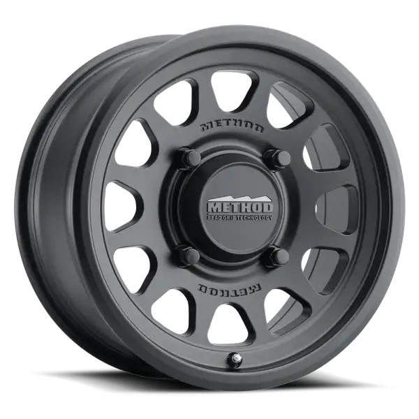 Method MR414 Bead Grip 15x7 / 5+2/38mm Offset / 4x156 / 132mm CB Matte Black Wheel